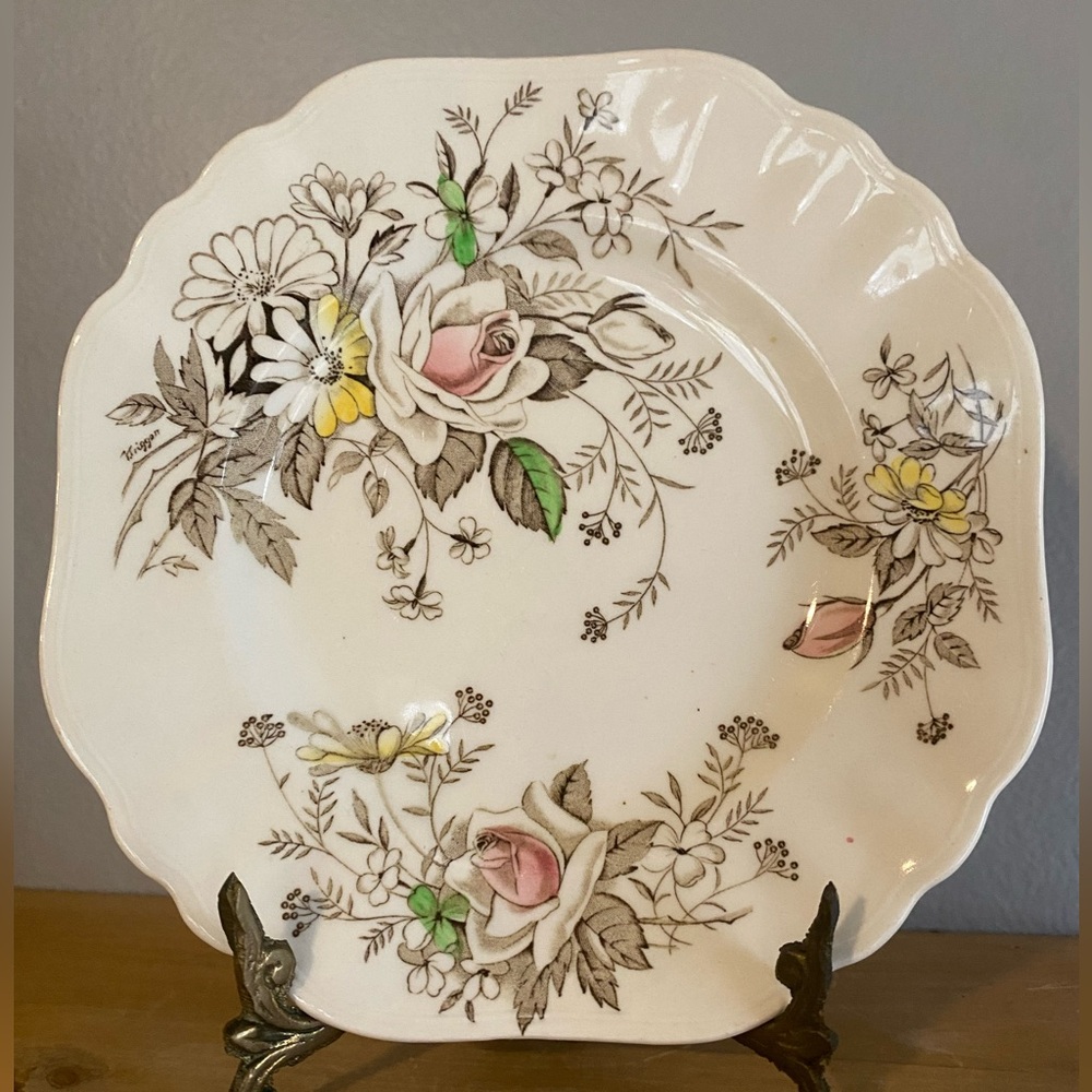 A vintage J & G Meakin "Old World Charm" floral dinner plate.